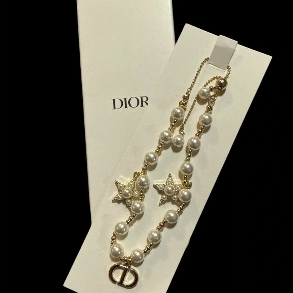 New in Box Dior VIP Gold and Faux Pearl Star Charm Bracelet Adjustable - Picture 1 of 4
